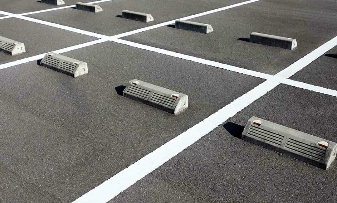 parking-wheel-stops-tire-stoppers-1080x651
