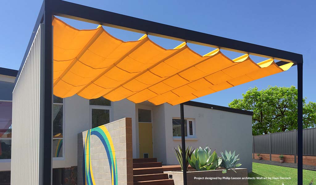 retractable_shade_sail_yellow_shaderunner